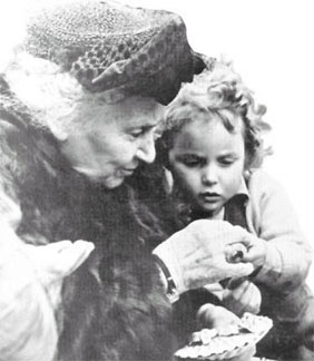 photograph of Dr. Montessori and a child